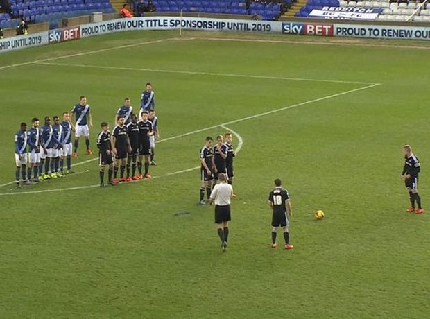 Birmingham-and-Brentford-players-line-up-in-separate-walls