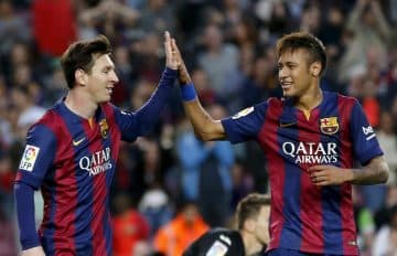 Barcelona’s Lionel Messi and Neymar celebrates Xavi Hernandez’s goal against Getafe during their Spanish first division soccer match at Nou Camp stadium in Barcelona